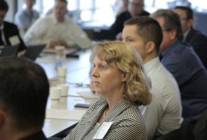 M city leadership meeting woman at conference table