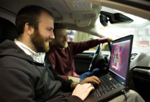 Engineering students in Ford Fusion