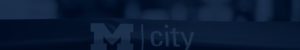 M city grand opening ribbon